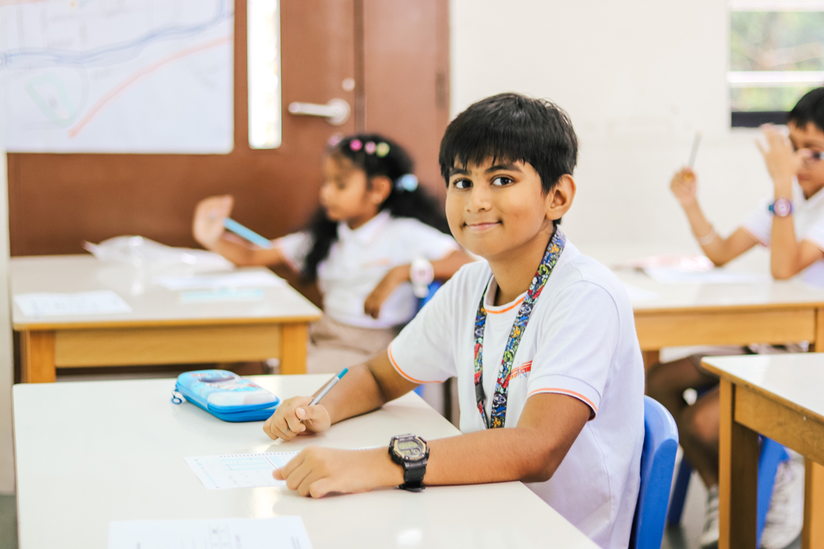 International primary school student taking test in Singapore