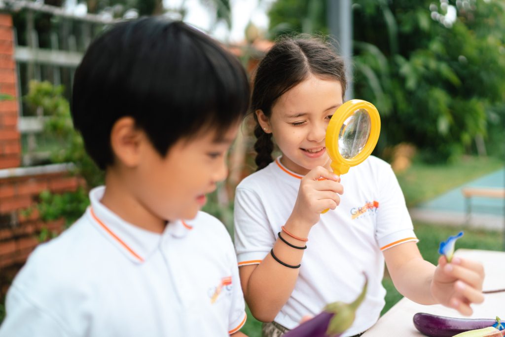 Primary school students learning outdoors