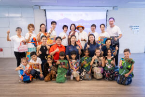 Students from The Grange pose for a photo with TOUCH’s elderly beneficiaries Image 2